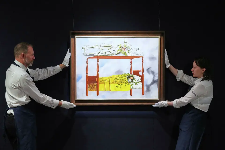 A painting by Frida Kahlo titled “El sueño (La cama)” is displayed at Sotheby’s auction rooms in London, Sept. 19, 2025. It sold Thursday, Nov. 20, for $54.7 million at Sotheby’s, setting a new auction record for the artist and becoming the most expensive work by a woman ever sold at auction. Kirsty Wigglesworth/Associated Press
